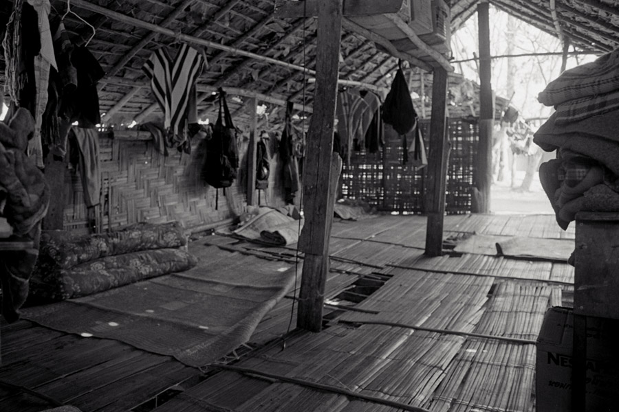 Huay Kha Lote: these dorms are basic bamboo structures. Students must roll up their bedding each day to make floor space for everyone, and share a common 'closet rod'.