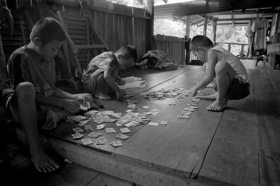 2011: playing in a typical wooden stilt home in Pho Phra, about 40 minutes from Mae Sot.