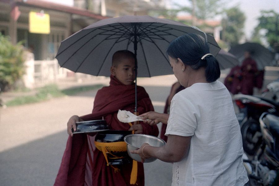 Myeik, Tanintharyi Division 2013: monks collecting morning alms.