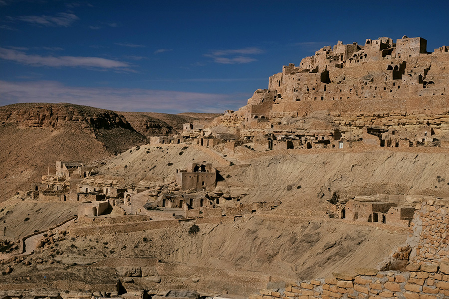 Chenini, Tunisia 2019: with around 300 people, Chenini's population is much greater than other ancient Berber villages in the Tataouine governate. Most original residents relocated to new Chenini, but the mountainside trogolodye homes here are on the grid, including caf&eacute;s with wifi, cave hotels, and a beautifully-electrified night view.