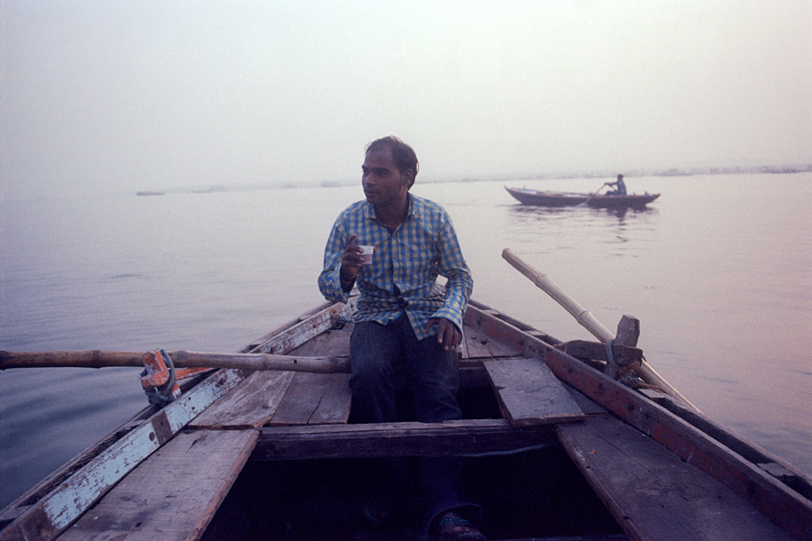 Varanasi, India 2014: I met Sonu the previous evening when I'd agreed to go with a different boatman for a few rupees less. After the ride, he tried to lecture me on choosing the wrong guy--and I had, that guy was terrible, but it also seemed like they were friends since they'd been playing  a card game moments before. We traded a few sarcastic remarks that ended up cracking both of us up, leading to his offer for chai, and soon convincing me to join him for another ride in the morning. 
<br><br>                      
He bought more chai and breakfast afterwards, and regaled me with stories about his life. It's worth taking two rides on the Ganges no matter what because you can see the ghat activity at different times of day, but with good luck you can also have great conversation with a new friend.