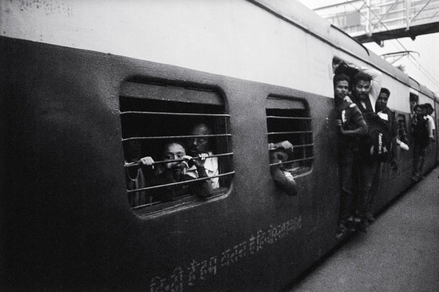 Kolkata, India 2014: Crowded train to Kolkata's northern suburbs.