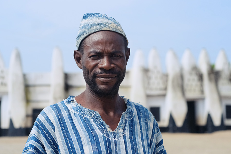 Wa, Ghana 2018: an aide to the Wa Naa (chief of Wa), photographed in front of the Sudanese-style palace.